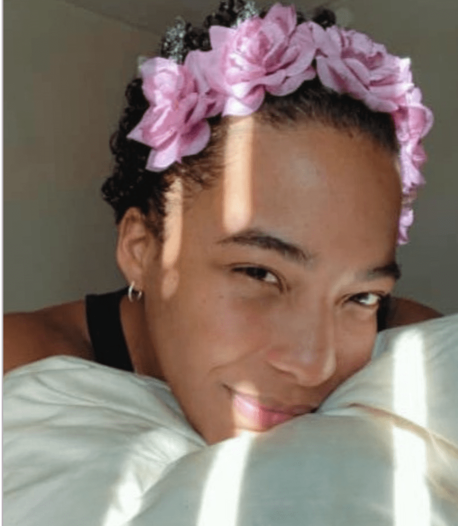 Hero banner for Rebloom Studio showing Analisa Velez in a flower crown, overlaid with the text “Welcome to Rebloom Studio — A digital sanctuary for soft restarts.”